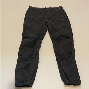 REI Black Cargo Jogger Pants with Zip Pocket and zipper on legs
